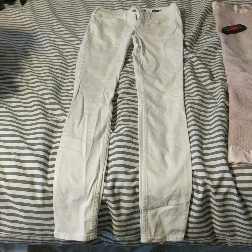 White very clean size 23 low rise  skinny